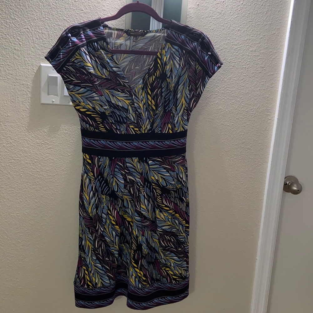 BCBGMAXAZRIA dress with colorful print and button detail on sleeves